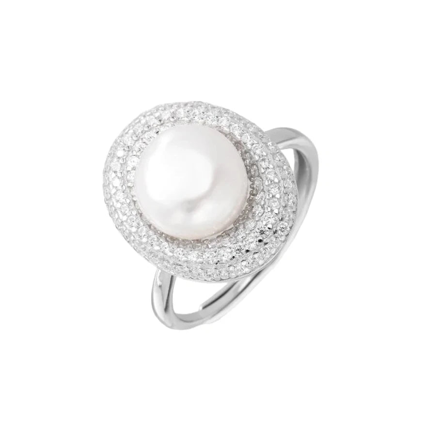 Silver ring with lustrous white pearl center surrounded by sparkling crystal halo on light background.