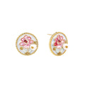 Gold-rimmed circular stud earrings with hand-painted pink peony enamel and pearl accents on white background