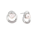 White gold-plated brass earrings with circular design, freshwater pearl center, and diamond accents