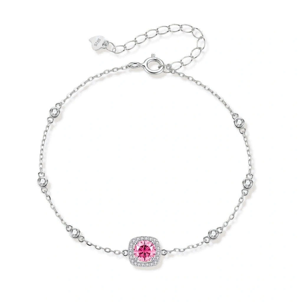 Elegant sterling silver chain bracelet featuring pink moissanite center stone in cushion halo setting with adjustable clasp