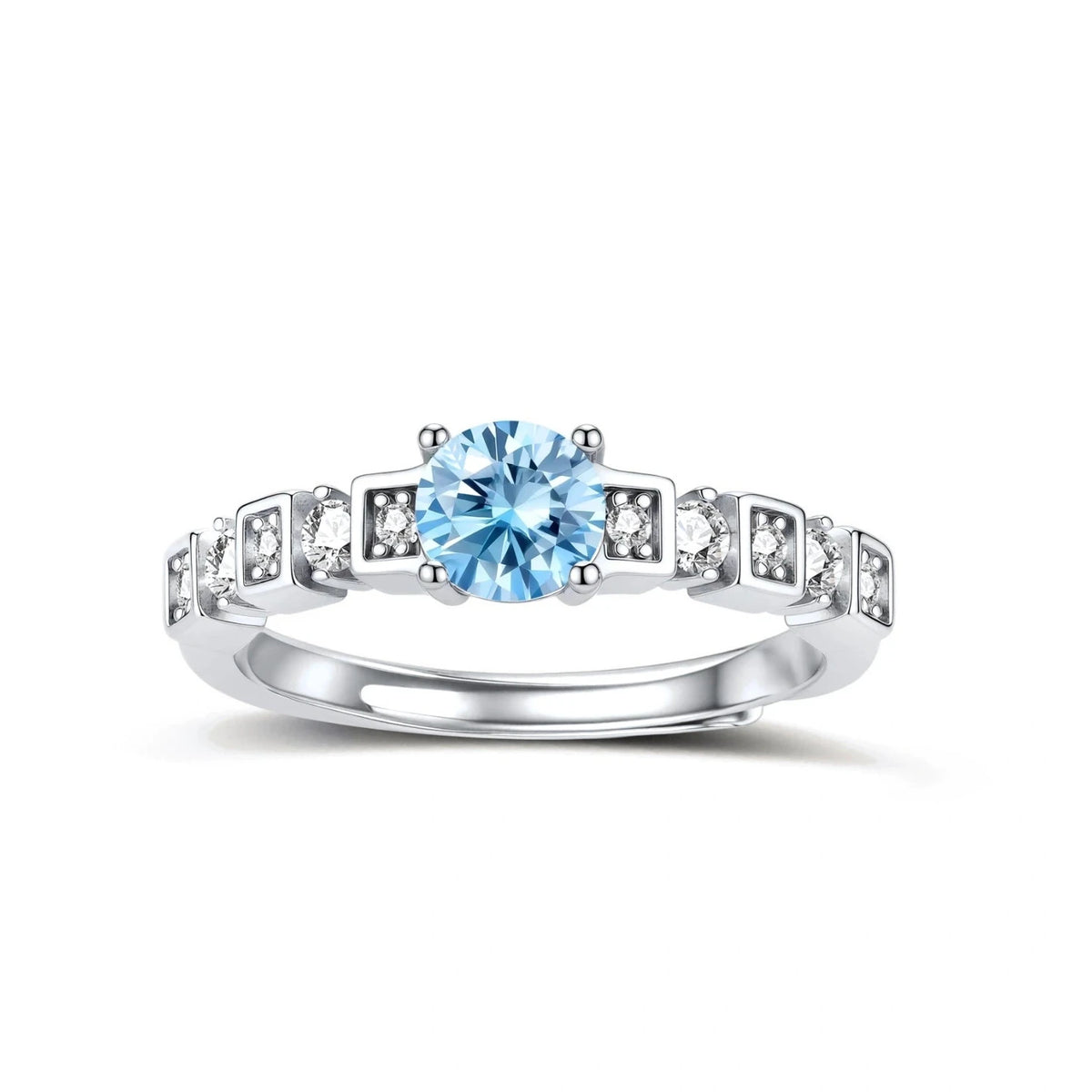 Geometric sterling silver ring with light blue moissanite center stone and square diamond accents on white background