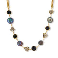 18k gold-plated chain necklace featuring lustrous baroque pearls, black onyx rounds, and smoky quartz triangular stones on white background.